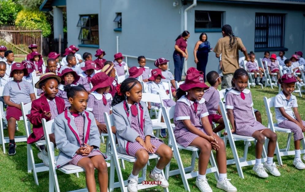A school gathering on the lawn at Divine Montessori School